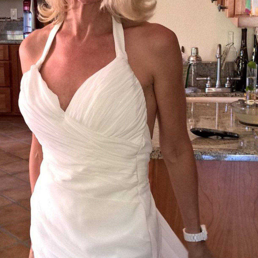 Ivory Chiffon backless wedding dress; wateau train